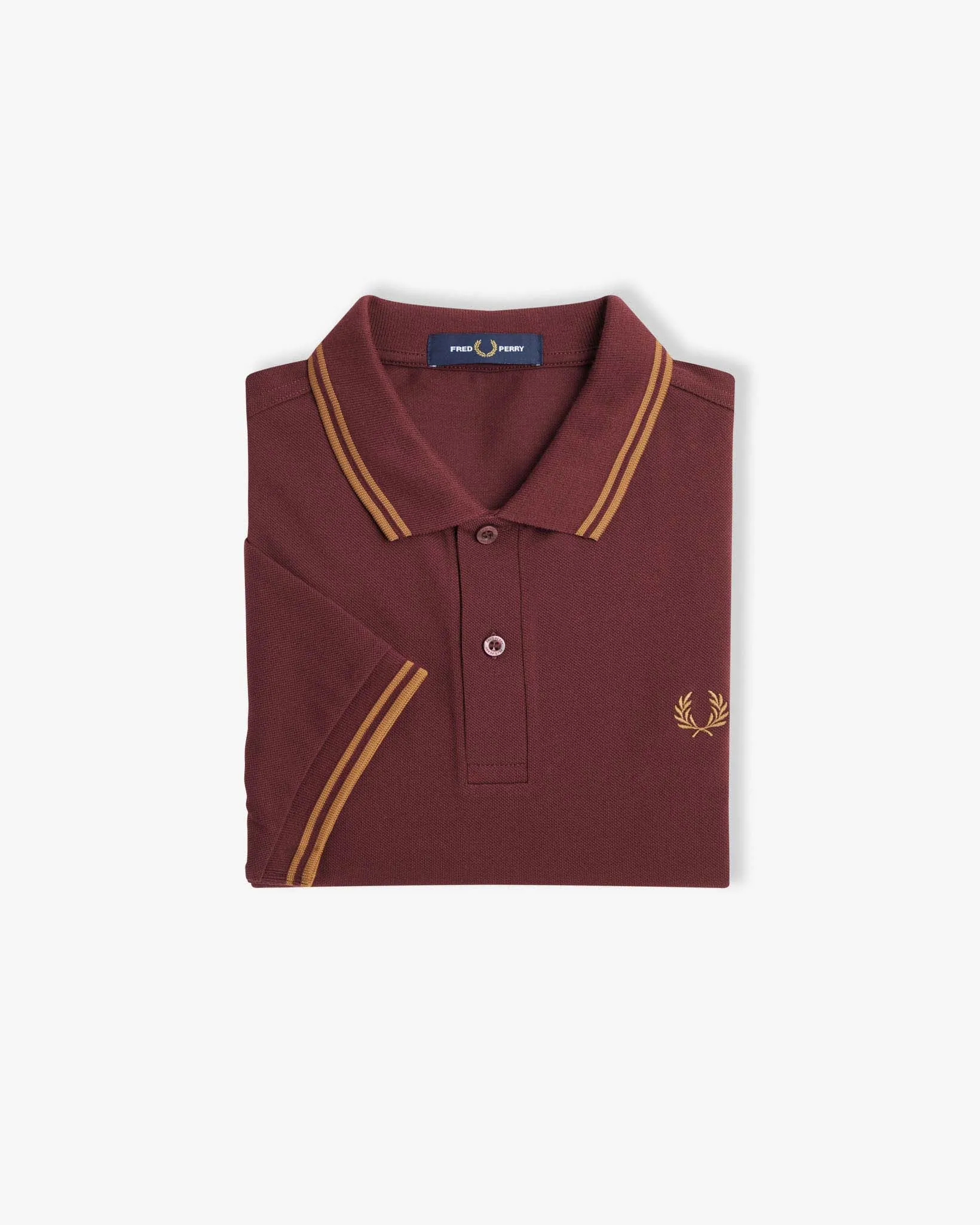 Polo mezza manica bordeaux con bordino color rame