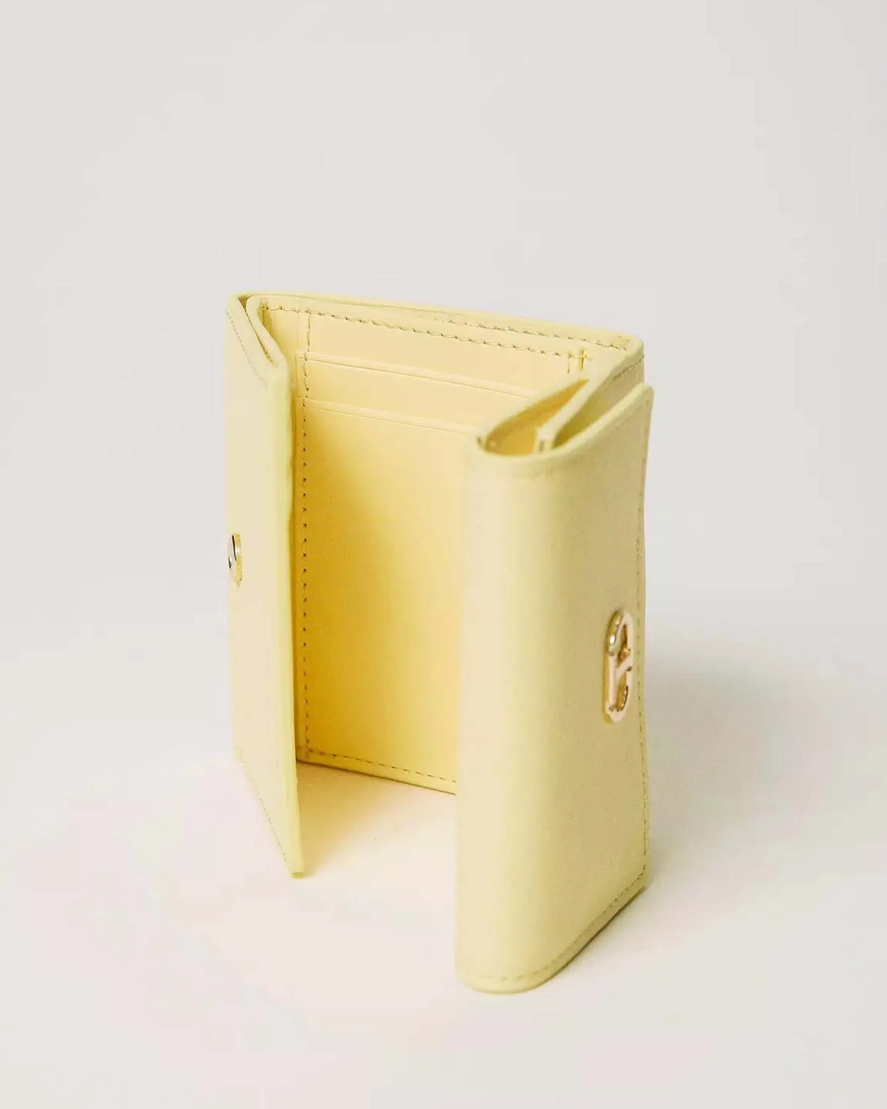 Portafoglio giallo in simipelle effetto saffiano con tasca esterna per le monete